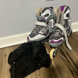 Roller Blades with knee and ankle pads.